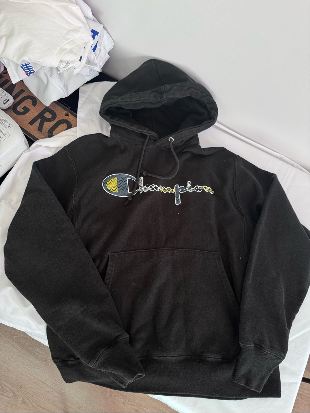 Champion Black Hooded Sweatshirt with Yellow Accent Logo